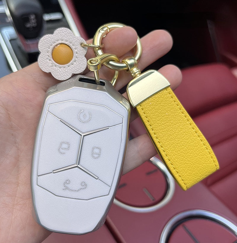 Venta al por mayor Llavero de cordón de fresa de cuero de vaca